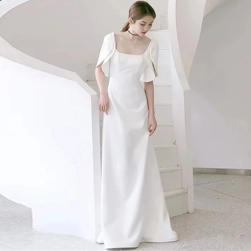 Elegant White Maxi Dress With Cape Sleeves