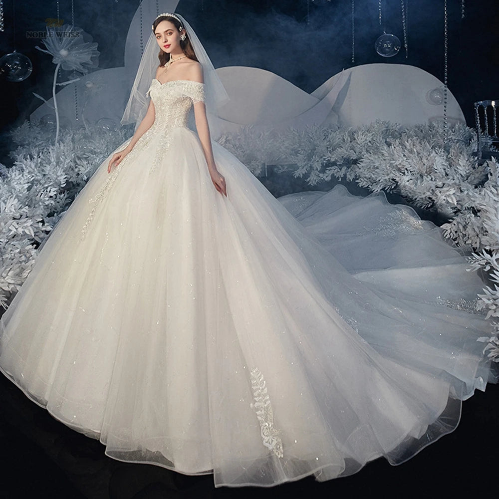 Elegant Off-shoulder Beaded Ball Gown Wedding Dress on Luulla