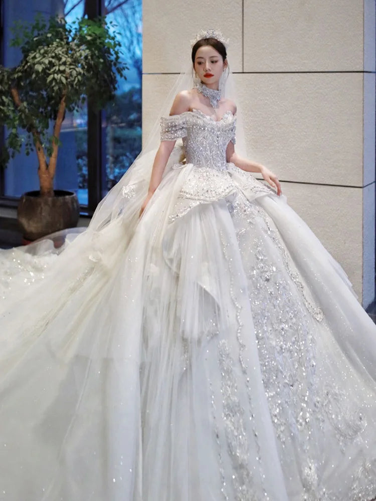 Elegant Off-shoulder Crystal Beaded Wedding Gown on Luulla